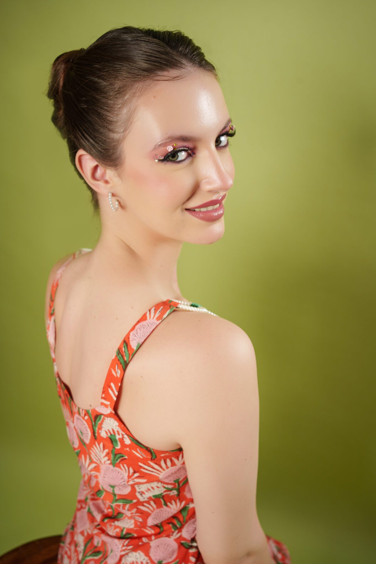 model smiling in peachy set
