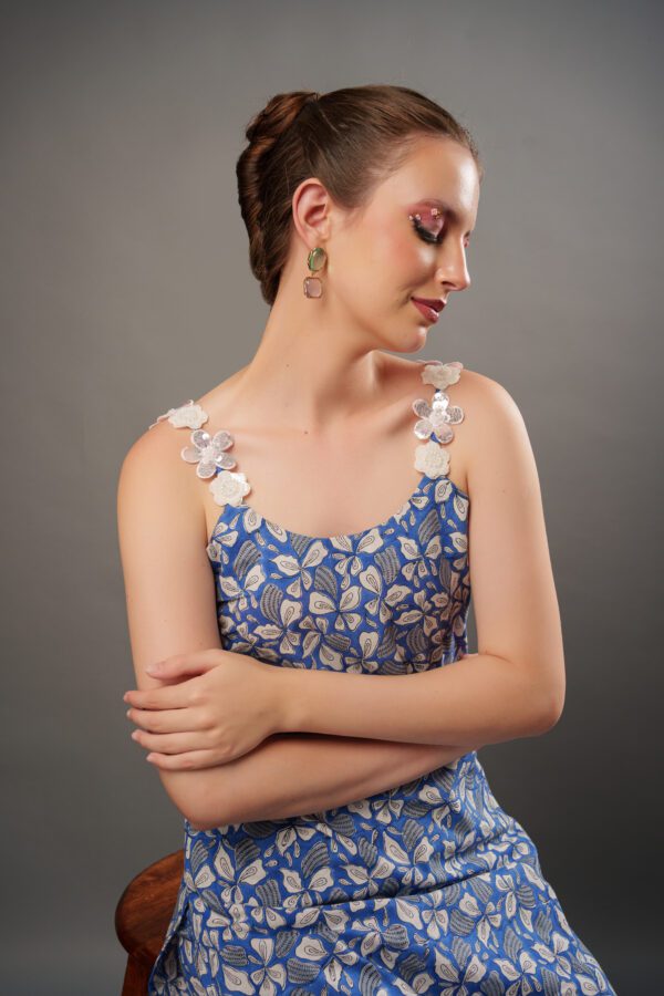 sapphire set kurta and shoulder detail, model looking down