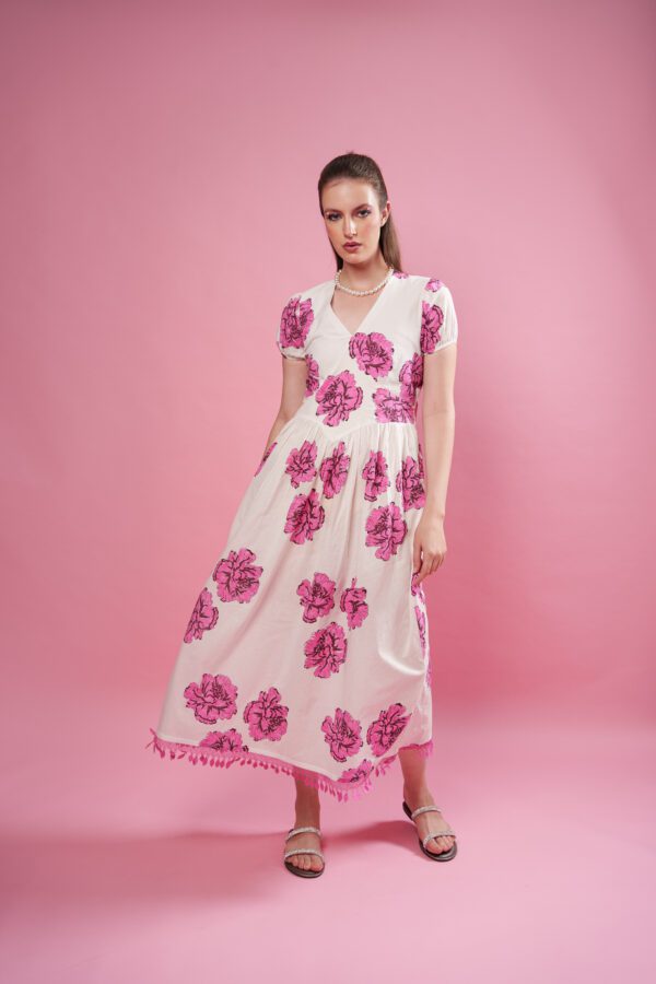 Rosina Dress frontside, and dress is flowing