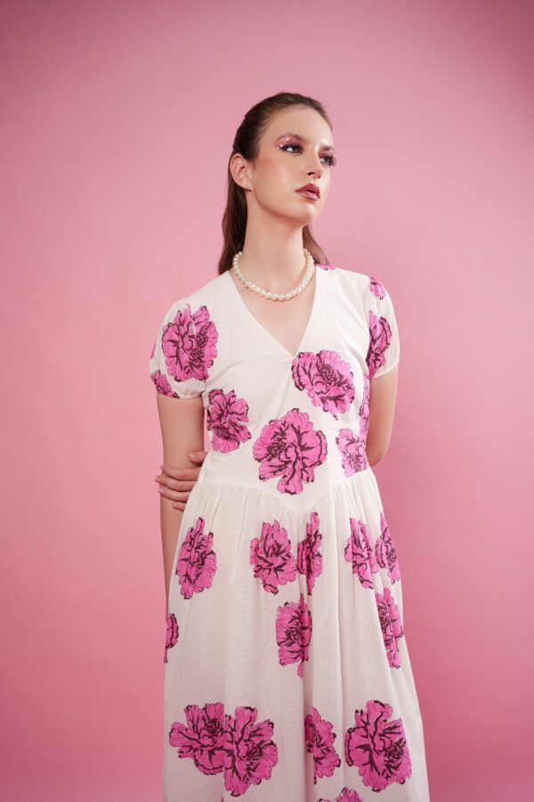 Rosina Dress Close up of the top, and neck. Model looking leftside
