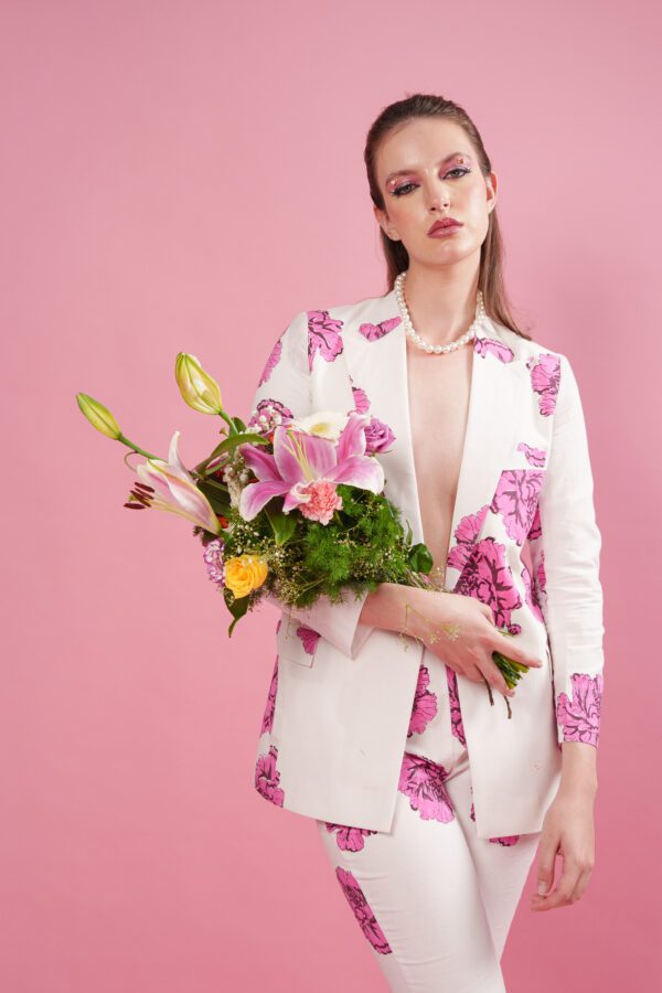blush set model holding flowers blazer