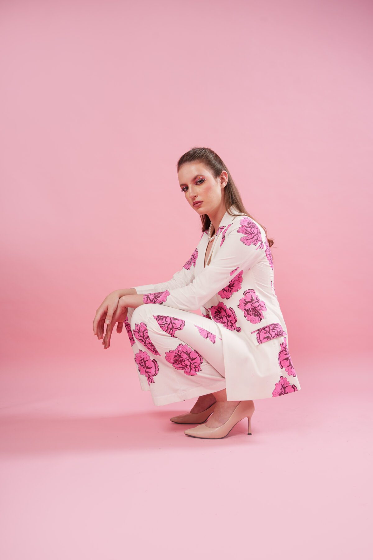 blush set model sitting down