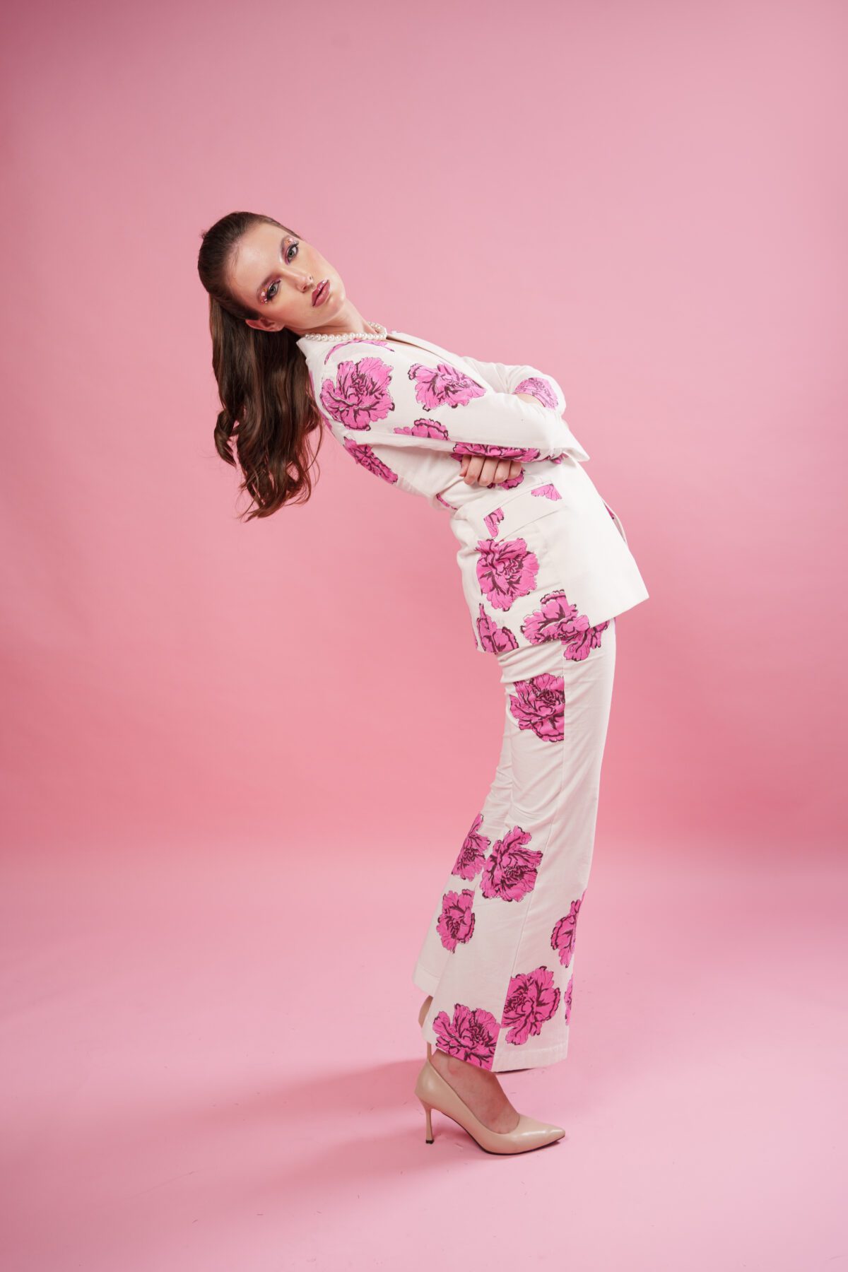 Blush Set model leaning back and looking straight