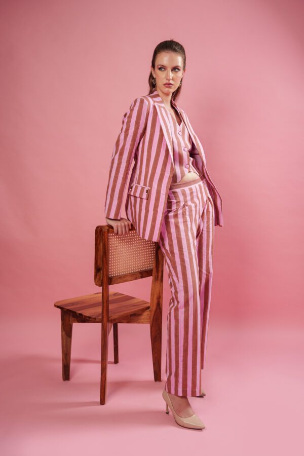 Rosewood set model leaning on chair