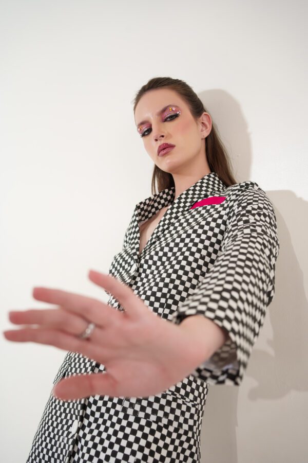 classic dress model's hand near camera