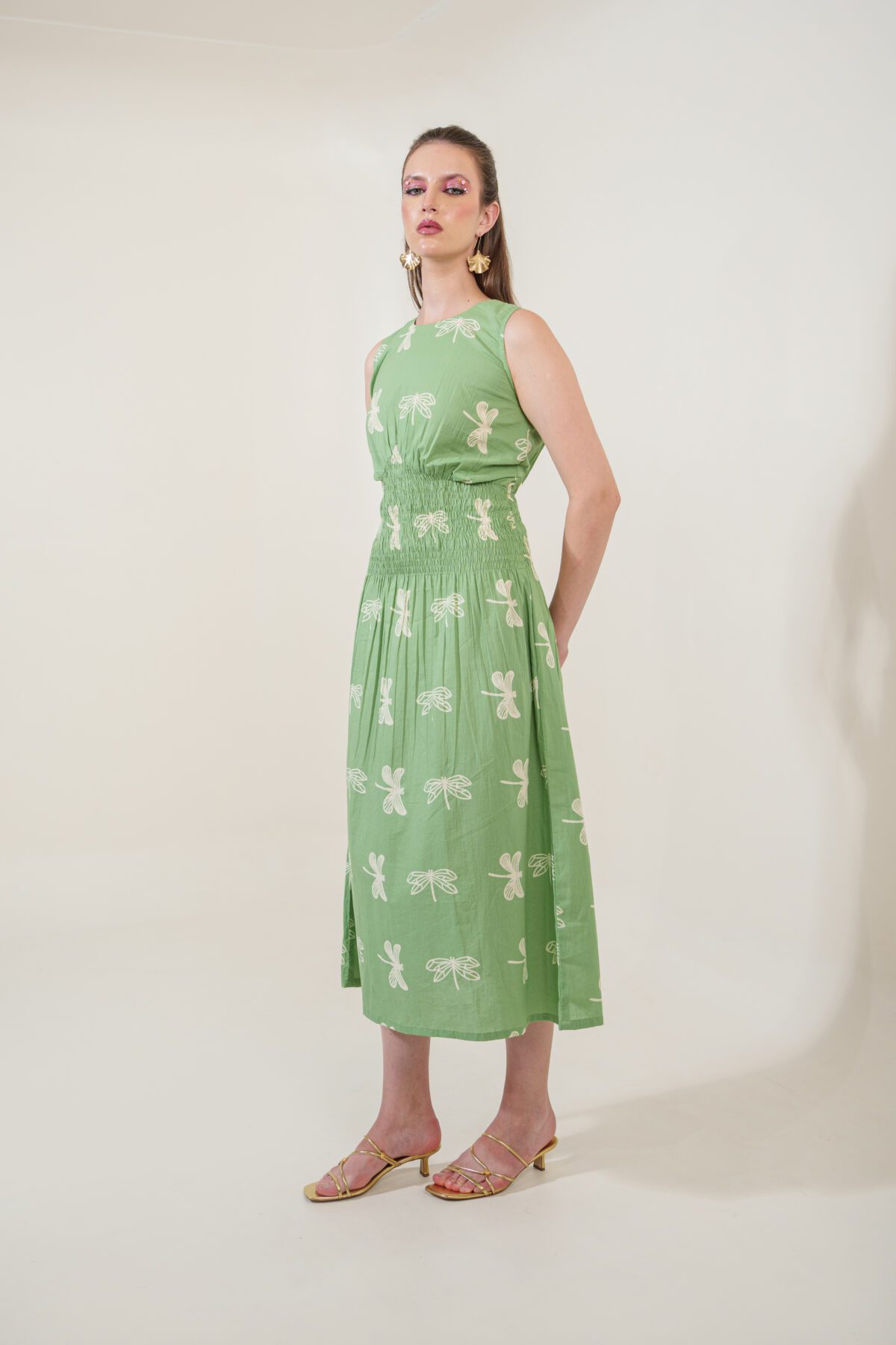 Firefly Dress rightside, with hands folded in the back