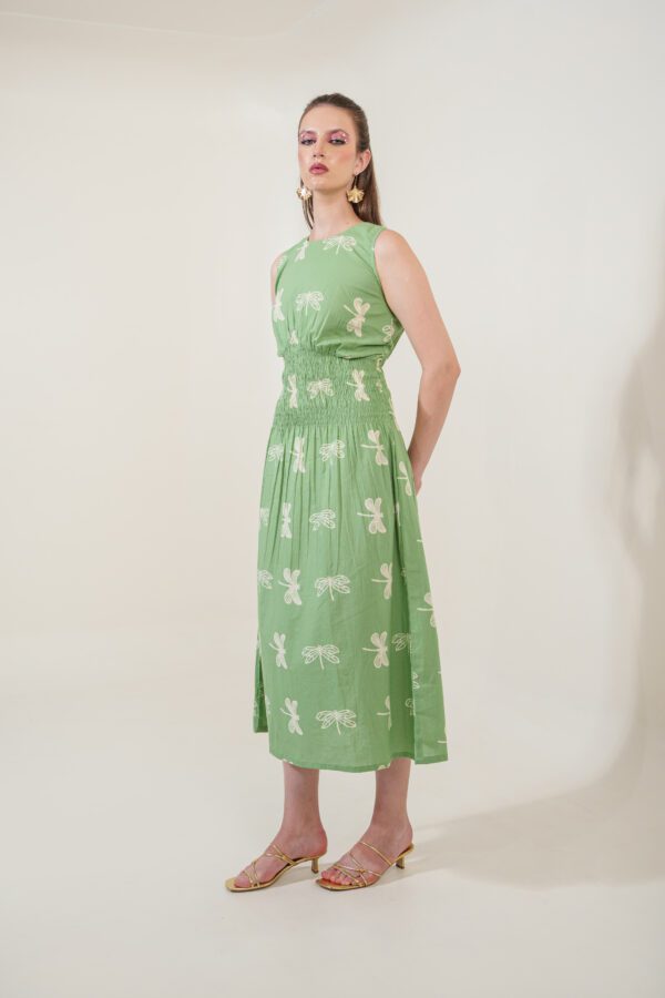 Firefly Dress rightside, with hands folded in the back
