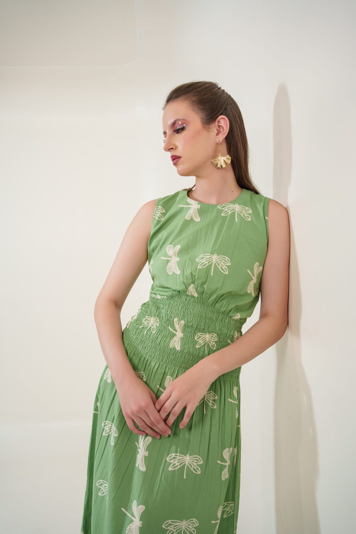 firefly dress model leaning on the right and looking right