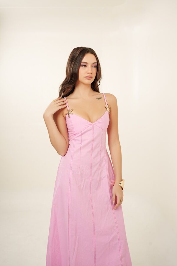 Starlette Dress model with hand on shoulder
