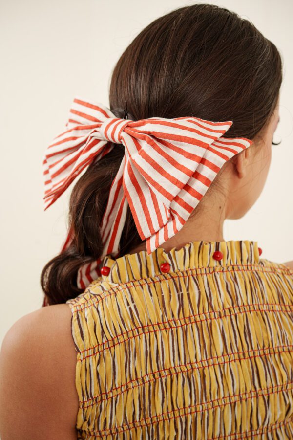 Taarini Dress backside and hair in the bow