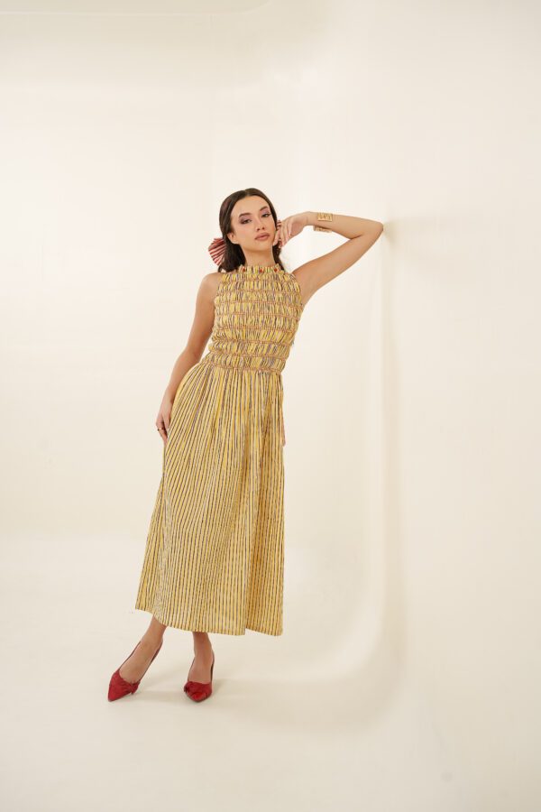 Taarini Dress model leaning left