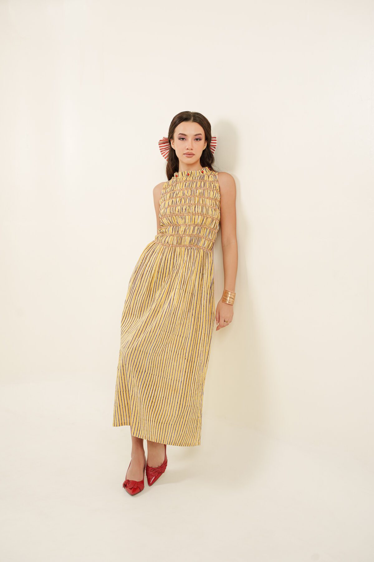 Taarini Dress model leaning back