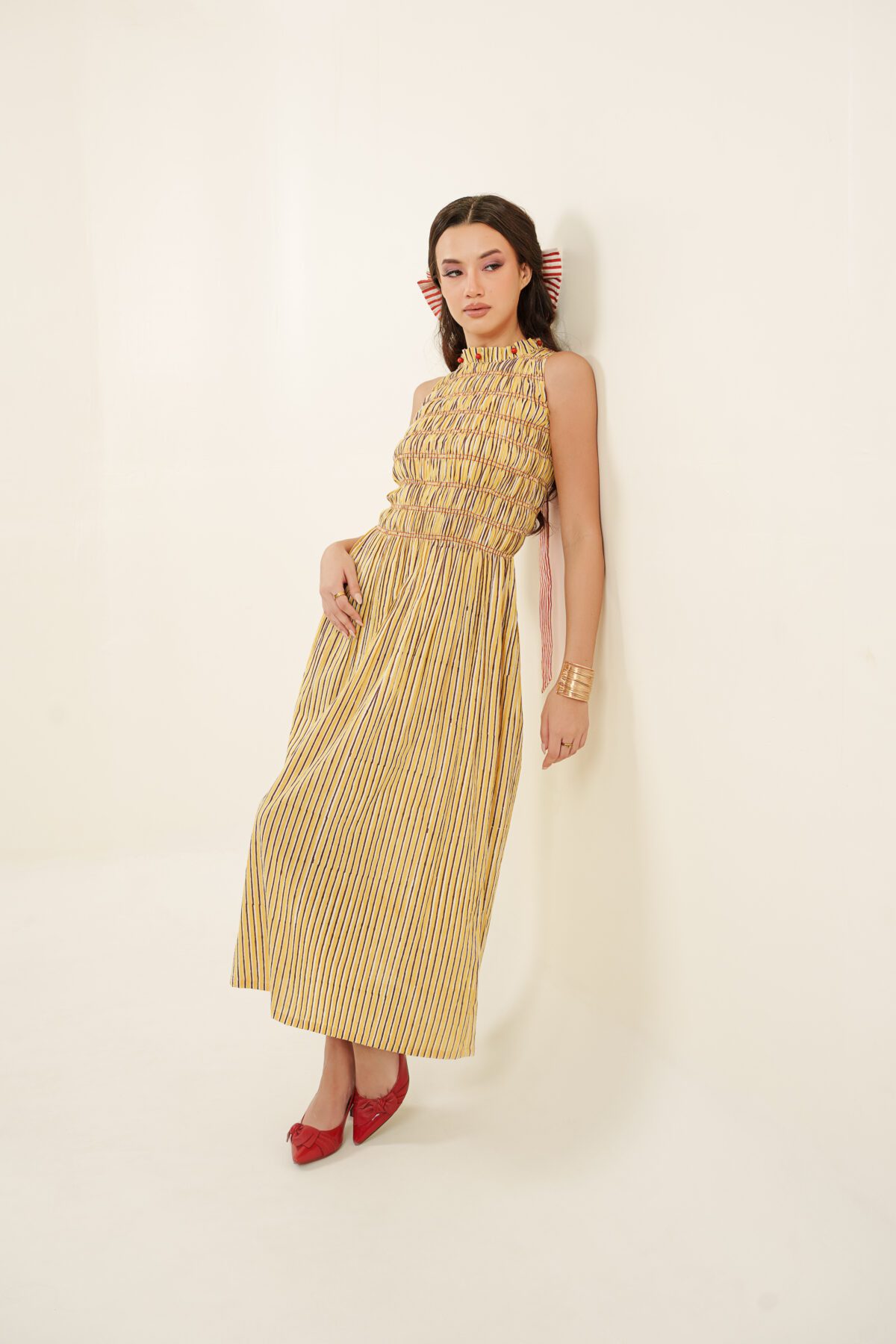 Taarini Dress model leaning back