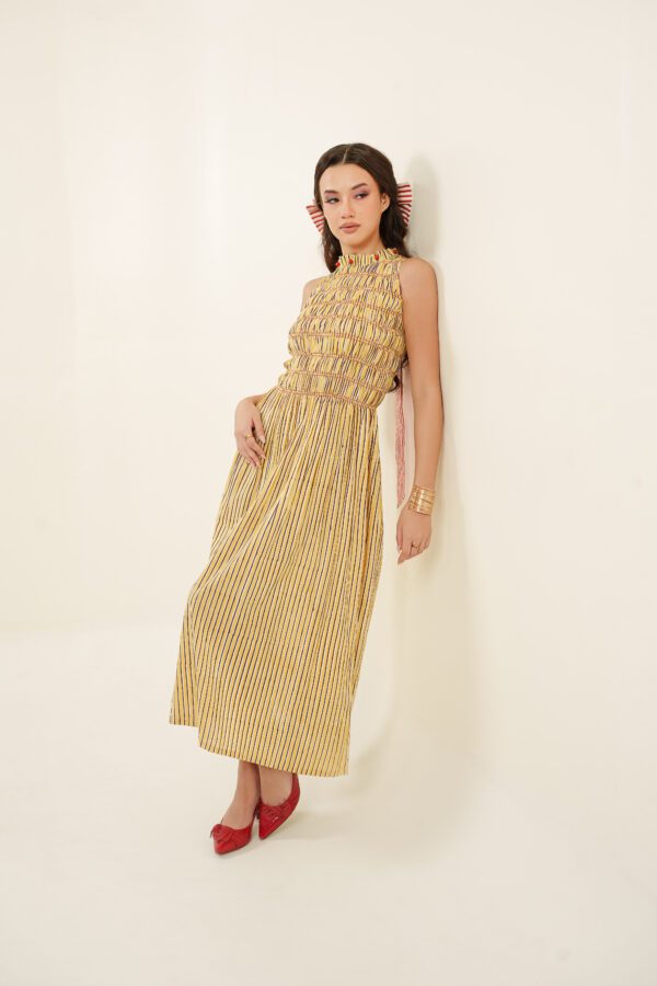 Taarini Dress model leaning back